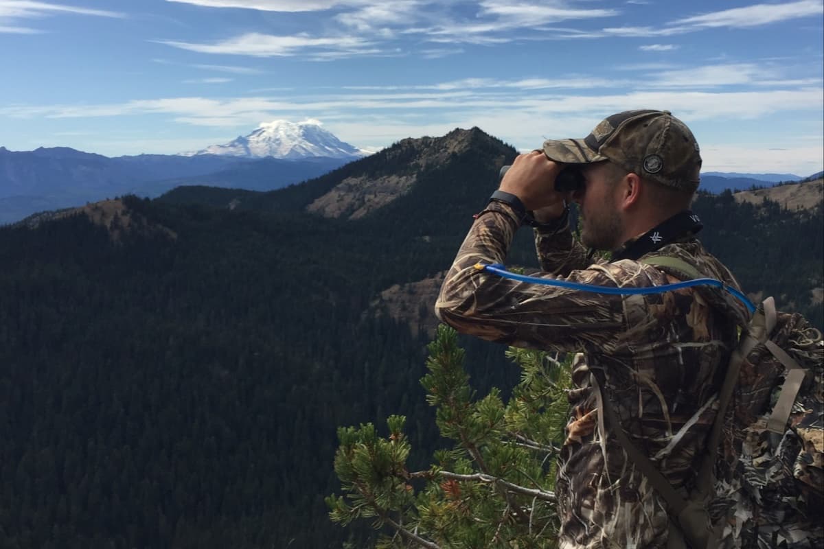 PHOTO: backcountry hunter glassing a basin