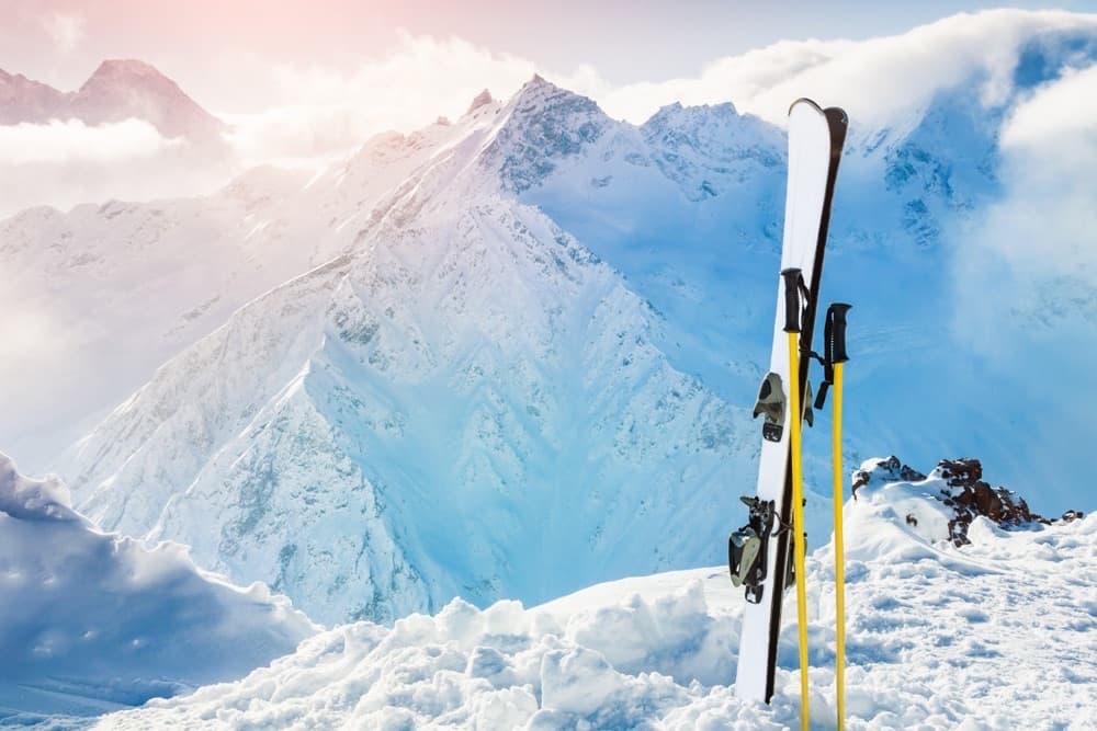 PHOTO: backcountry ski scene — skin track up a ridge / transition above treeline